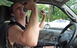 nissan_woman_singing_rocking_out_in_car_chad_grayot
